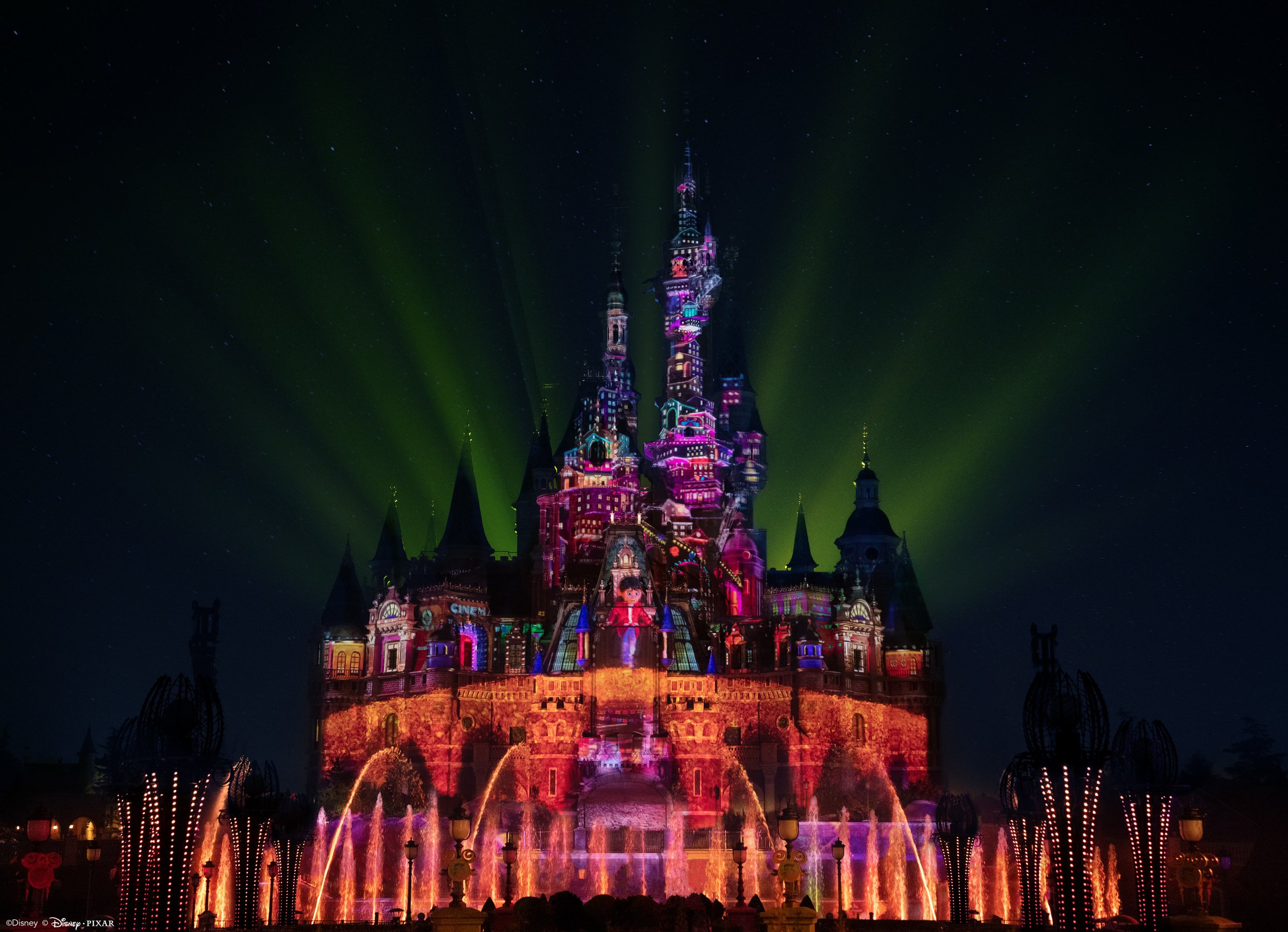 Projection-mapped effects and a shooting star over the castle
