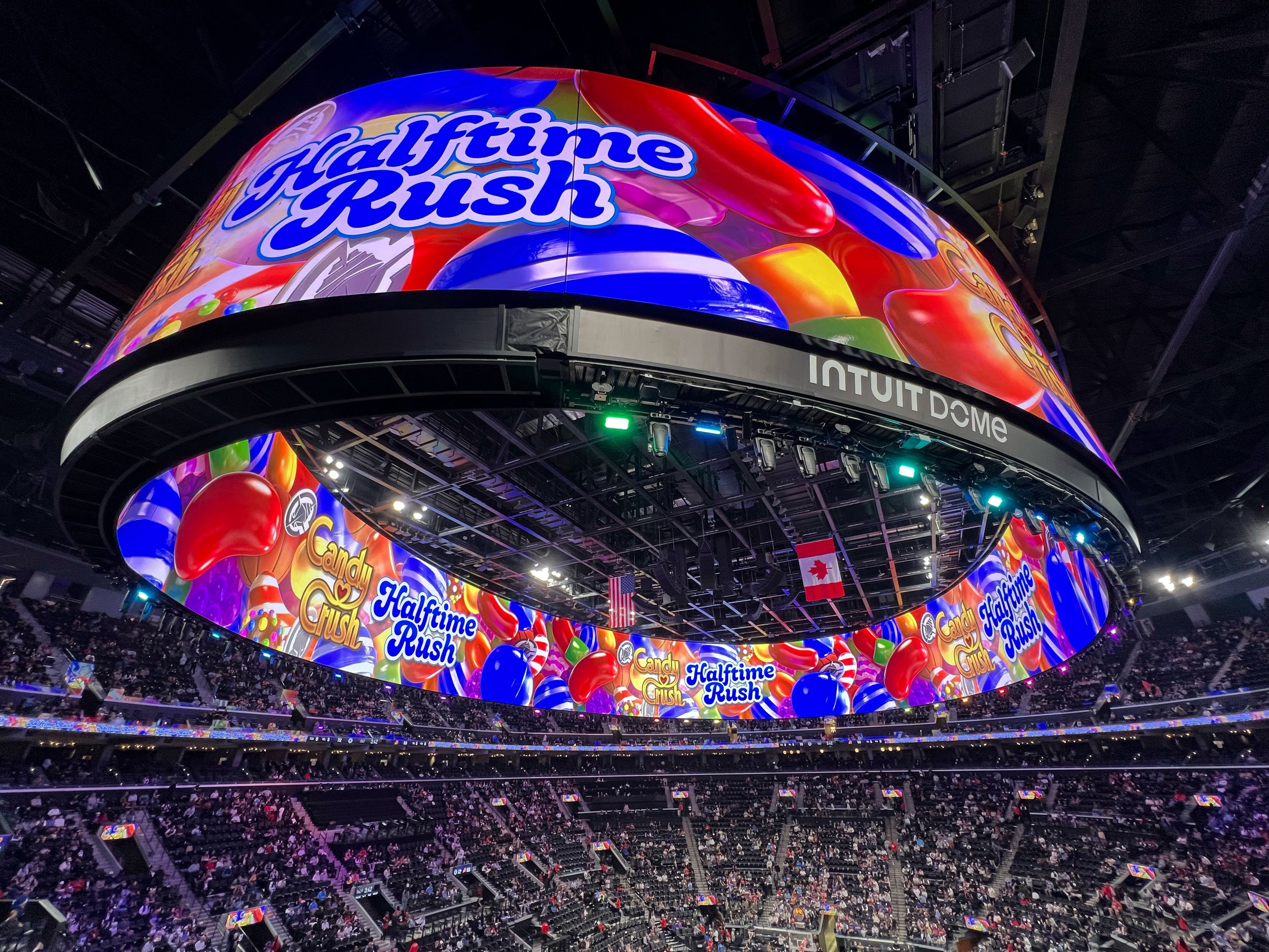 A fan spotlighted on the Halo screen during a crowd activation