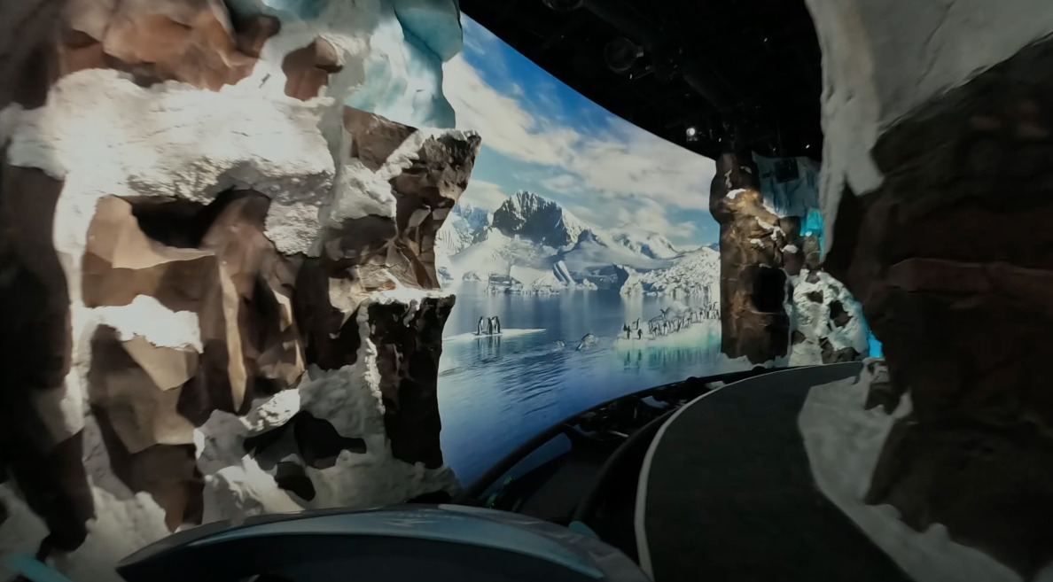 Ride vehicle POV of the ice cave queue's projected glacier screen